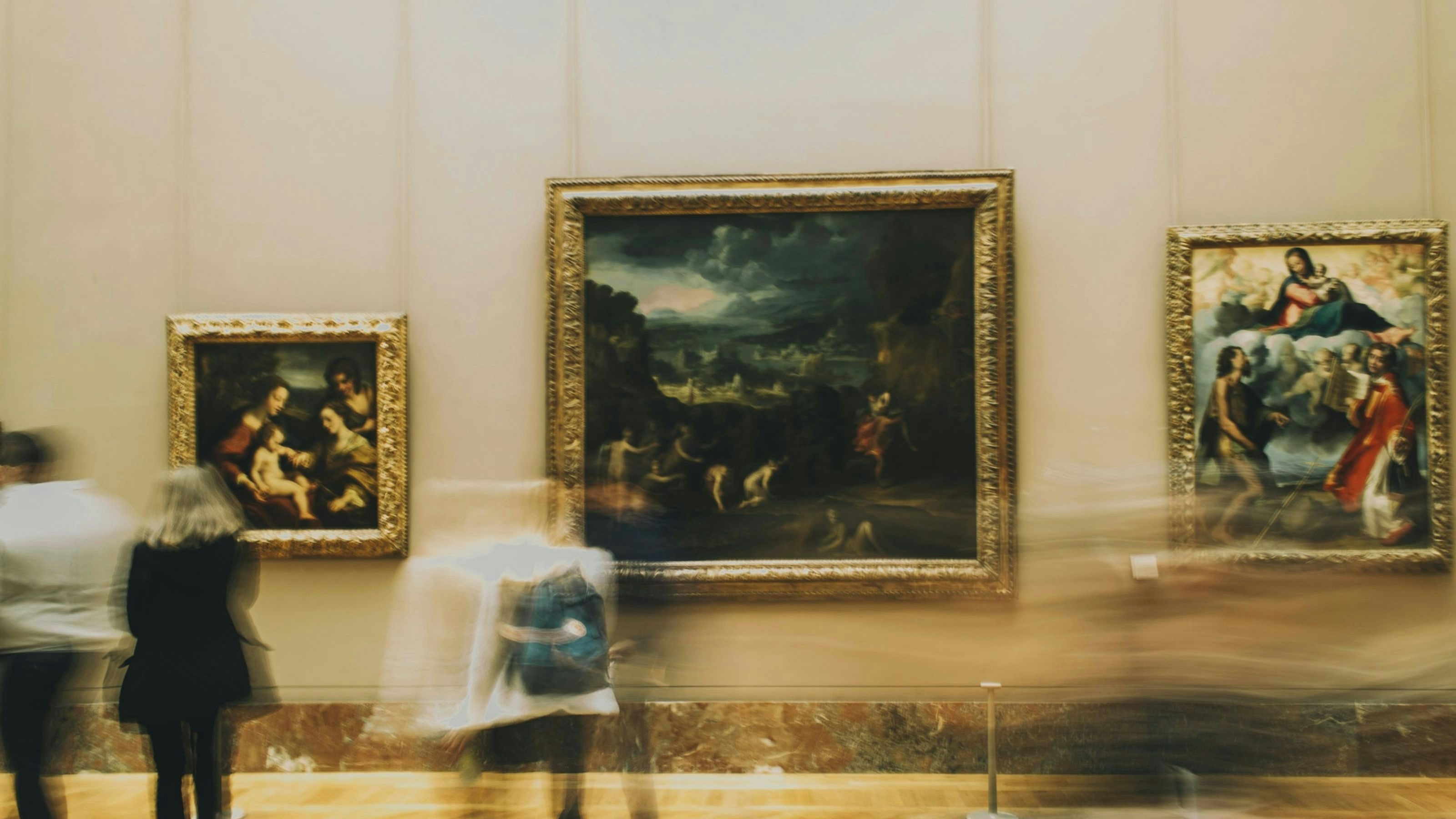 People looking at art in a museum